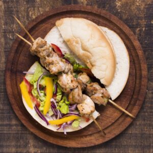 cooked-meat-veggies-kebab-skewers-with-pita.jpg